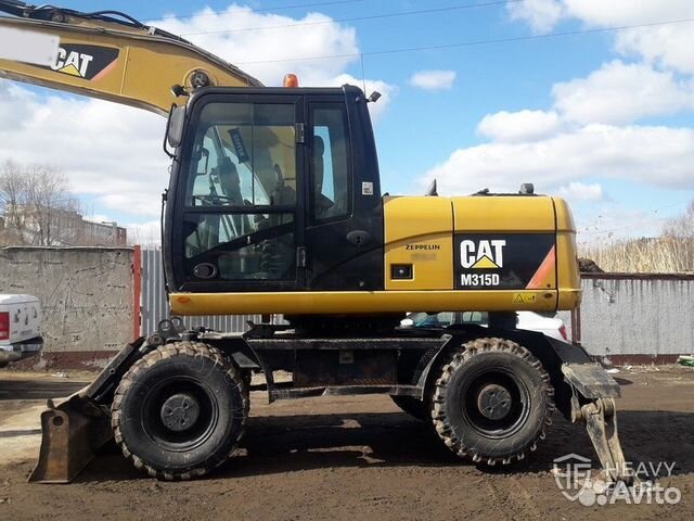 Колёсный экскаватор Caterpillar M315D 2013