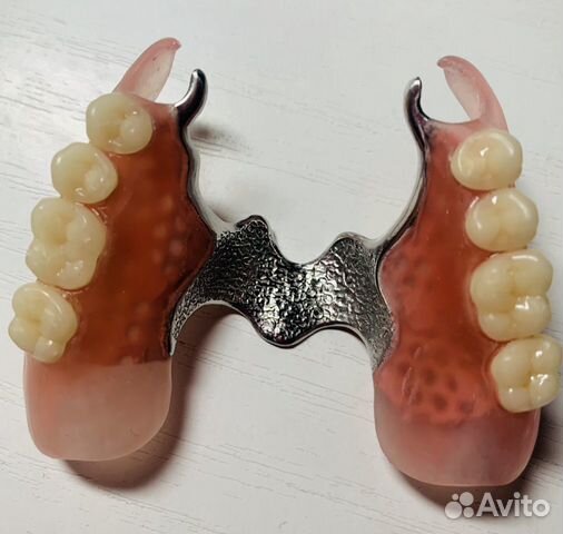 Зубной техник