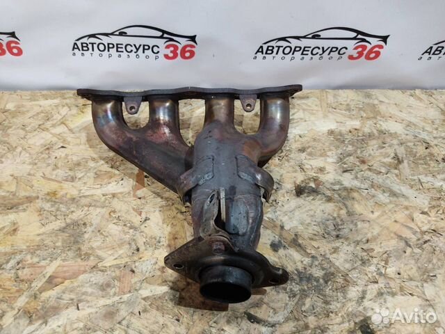 Выпускной коллектор 1.8 Митсубиси Лансер 10