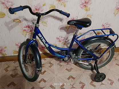 Продам детский велосипед с боковыми колесами