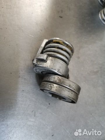 Натяжитель приводного ремня VAG 1,4TSI 03C145299Q