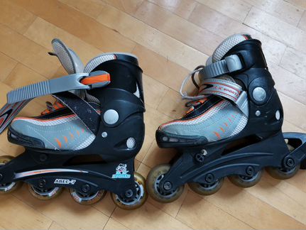 Роликовые коньки