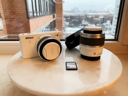 Nikon 1 j1 Фотоаппарат с 2-мя сменными объективами