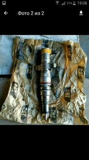 Блок управления двигателем на CAT D6R, форсунка