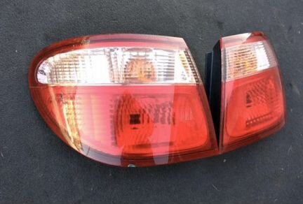Фонарь задний на седан Nissan Almera N16