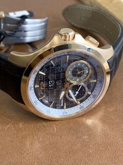 Часы girard perregaux WW.TC traveller large date